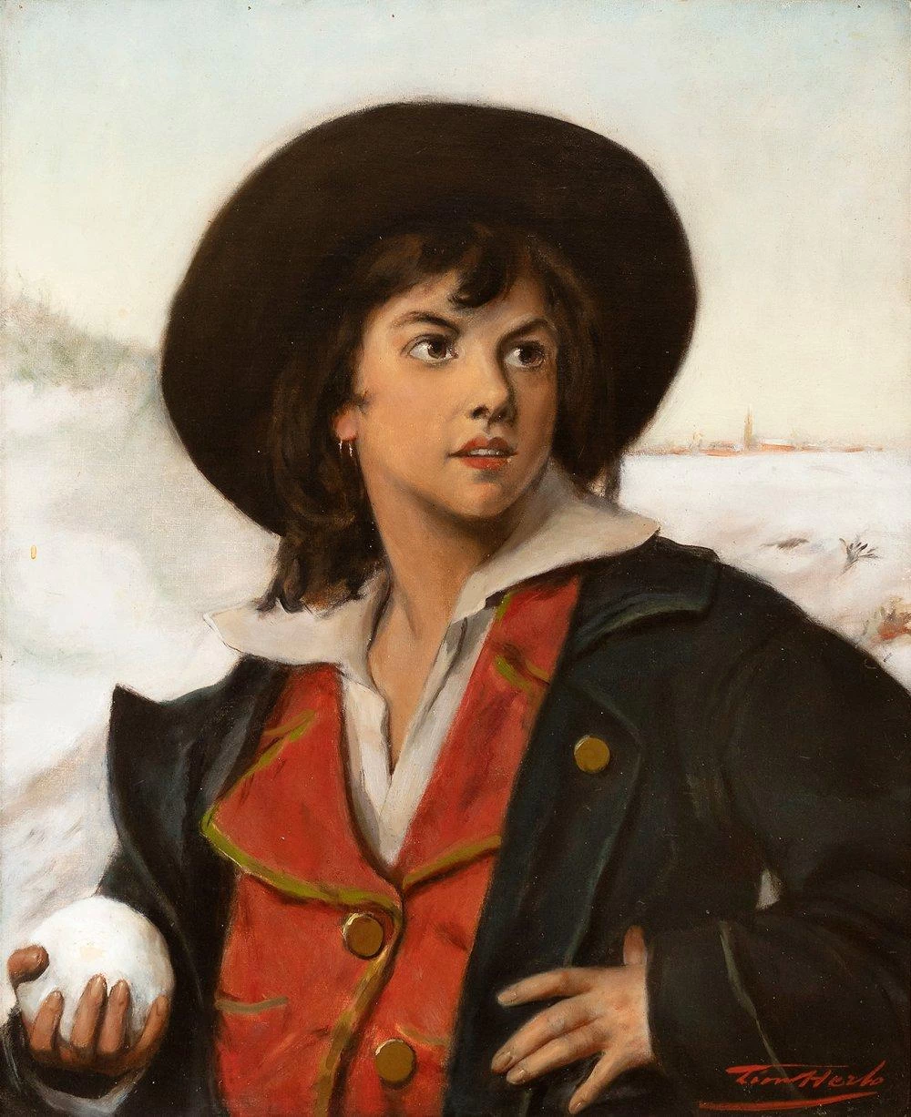 Giovane uomo con una palla di neve
